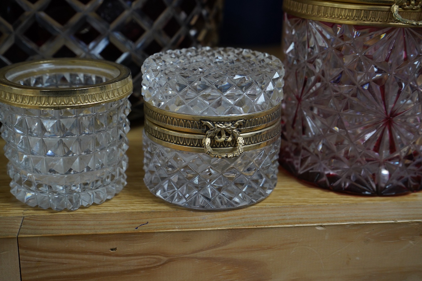 Three Bohemian ruby overlaid glass bowls and two jars, largest bowl 23cm diameter. Condition - some very minor nicks and light surface scratches, otherwise good